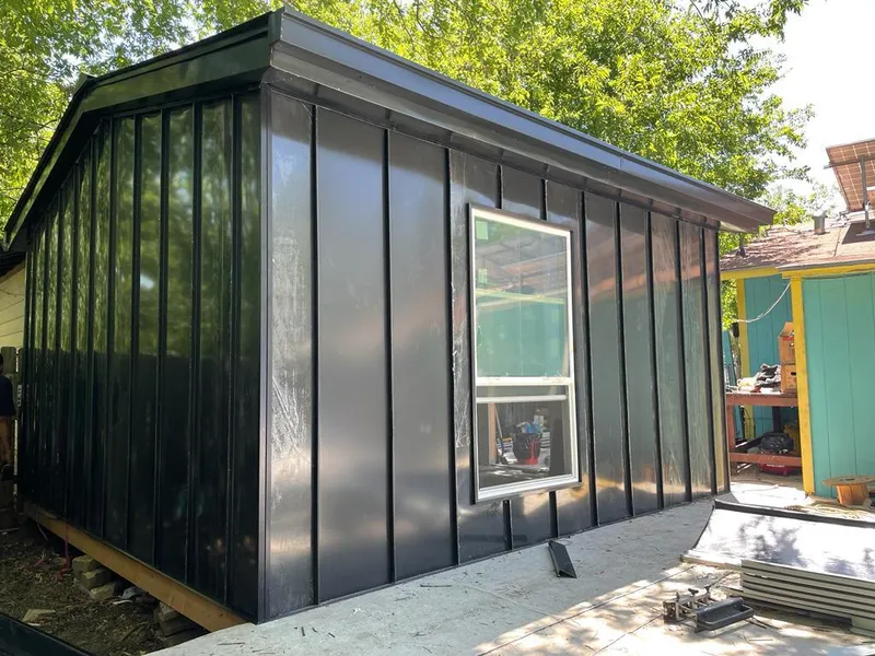 Black standing seam metal wall panels for Roof Inspection in Fruitvale